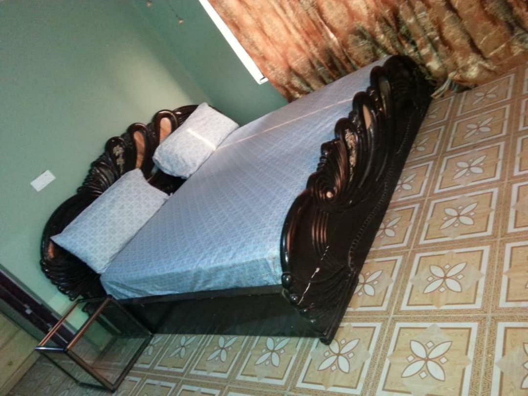 Gya-Son Royal Guest House คูมาซี ภายนอก รูปภาพ